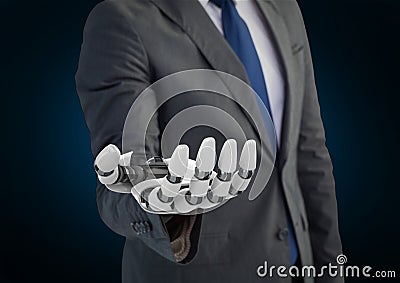 Businessman with robot hand against blue background Stock Photo