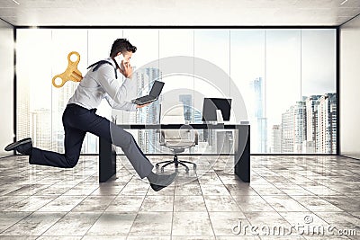 Businessman runs for work without getting tired with extra energy Stock Photo