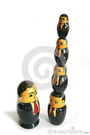 Businessman Russian dolls Stock Photo