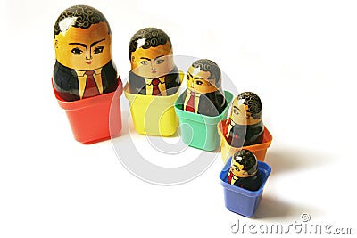 Businessman Russian dolls Stock Photo