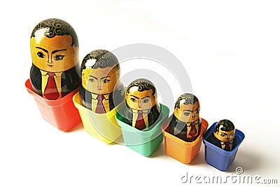 Businessman Russian dolls Stock Photo