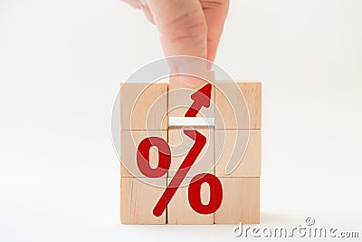 Hand complete up rising percent icon of square wooden block shape with isolated background for business strategy, Stock Photo