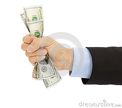 Businessman's hand grasping a handful of dollars Stock Photo