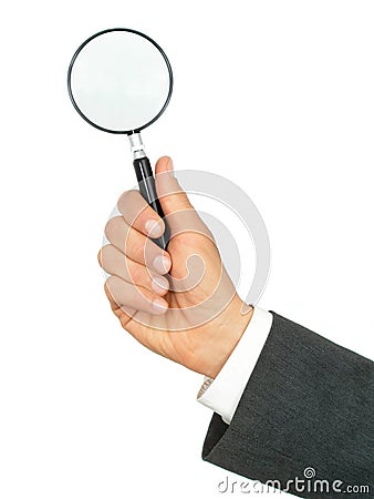 Businessman's Hand Holding Magnifying Glass Stock Photo