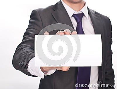 Businessman's hand holding up card on white Stock Photo