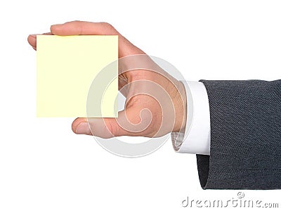 Businessman's Hand Holding Yellow Post-It Stock Photo