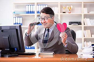 The businessman in saint valentine concept in office Stock Photo