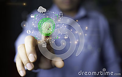 Businessman scan fingerprint with virtual screen interface to enter internet network.Futuristic virtual screen interface Stock Photo