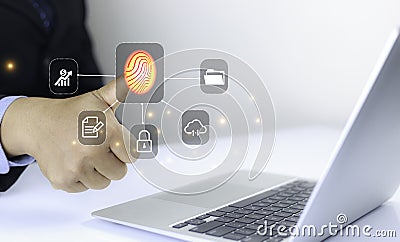 Businessman scan fingerprint with virtual screen interface to enter internet network.Futuristic virtual screen interface Stock Photo