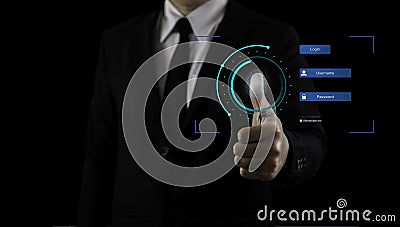 Businessman scanning finger to login on virtual screen, concept of digital security, security, data storage, online identity Stock Photo