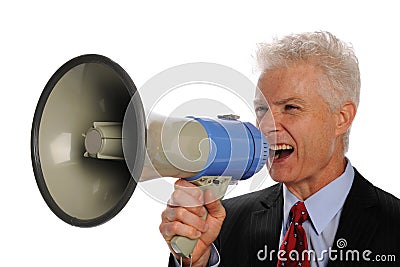 Businessman screaming with a megaphone Stock Photo