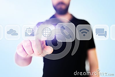 Businessman scrolling through communication apps on translucent digital display interface Stock Photo