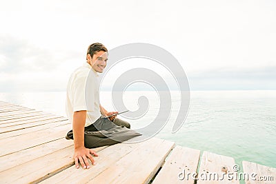 Businessman By The Sea Stock Photo