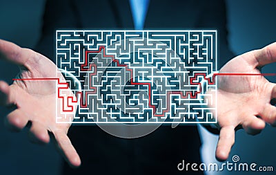 Businessman searching solution of a complicated maze Stock Photo