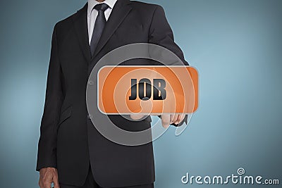 Businessman selecting orange tag with job Stock Photo