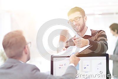 Businessman sends the employee a financial document a Stock Photo