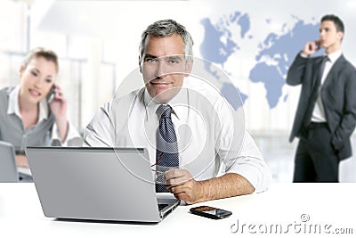 Businessman senior expertise teamwork world map Stock Photo