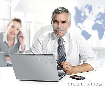 Businessman senior expertise teamwork world map Stock Photo