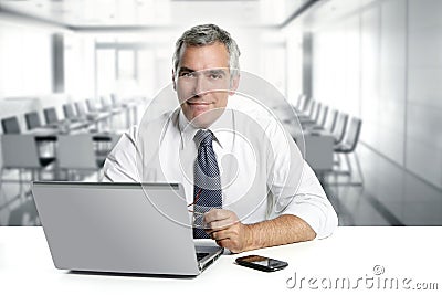 Businessman senior working interior modern office Stock Photo