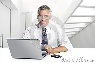 Businessman senior working interior modern office Stock Photo