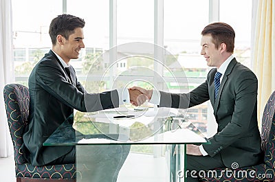 Businessman shaking hand, business situation Stock Photo