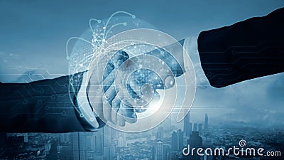 Businessman shaking hands with deal of partnership and customer digital global technology networking link connection on digital Stock Photo