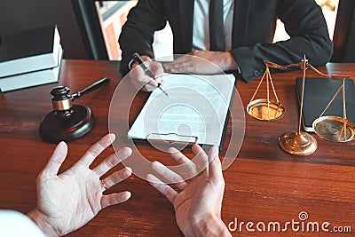 Businessman shaking hands to seal a deal Judges male lawyers Consultation legal services Consulting in regard to the various Stock Photo