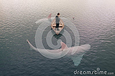 Businessman and sharks Stock Photo