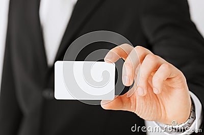 Businessman showing blank card Stock Photo