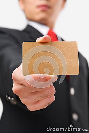 Businessman showing gold credit card Stock Photo