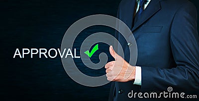 Businessman showing a thumbs up sign with Approval word on scree Stock Photo