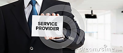 Businessman shows a business card with the message service provider. Professional technology service provider Stock Photo