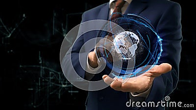 Businessman shows concept hologram Earth on his hand Stock Photo