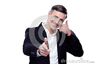 Businessman shows 'phone me' gesture Stock Photo