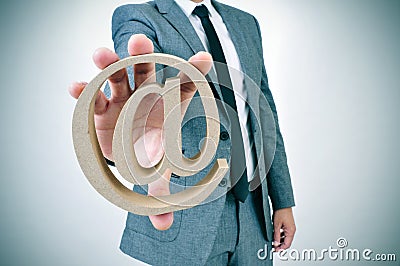 Businessman with an at sign Stock Photo