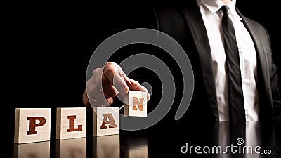 Businessman in a Simple Business Plan Concept Stock Photo