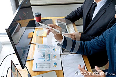 businessman sit at ther table looking at computer Stock Photo