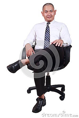 Businessman Sitting on Chair Isolated on White Stock Photo