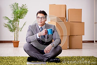 The businessman sitting on office floor Stock Photo