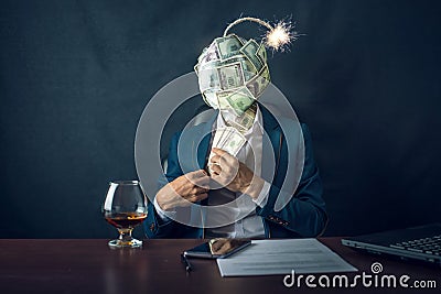 A businessman putting money in his pocket with a bomb in the form of a ball dollar bills instead of his head Stock Photo