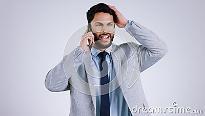 Businessman, smartphone and phone call with stress, frustrated and isolated on studio background. Mobile, professional Stock Photo