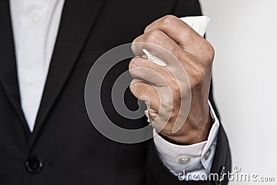 Businessman squeeze paper, hand close-up Stock Photo