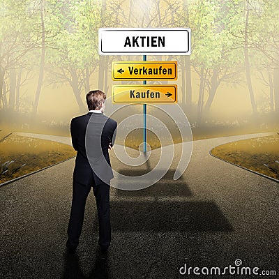 Businessman standing on a crossroad, having to choose the right path what to do with the words shares, sell and buy Stock Photo