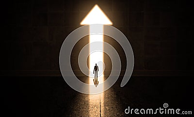 Businessman standing in a doorway arrow upward, confident business man stand in a dark hall with bright arrow door, New Stock Photo