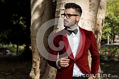 Businessman standing hand in pocket and the other loose Stock Photo