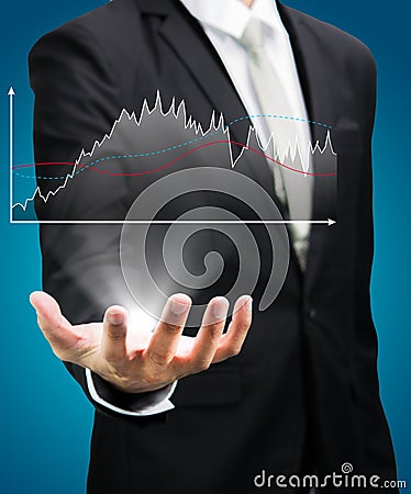 Businessman standing posture hand holding graph finance Stock Photo