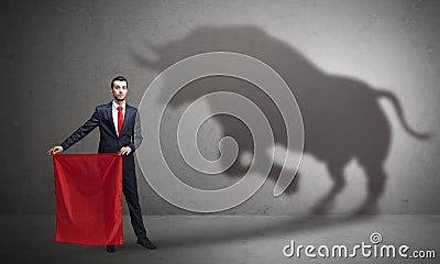 Businessman with bull shadow and toreador concept Stock Photo