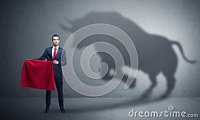 Businessman with bull shadow and toreador concept Stock Photo