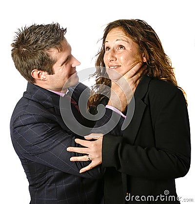 Businessman strangling a businesswoman Stock Photo