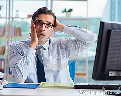 Businessman suffering from excessive armpit sweating Stock Photo